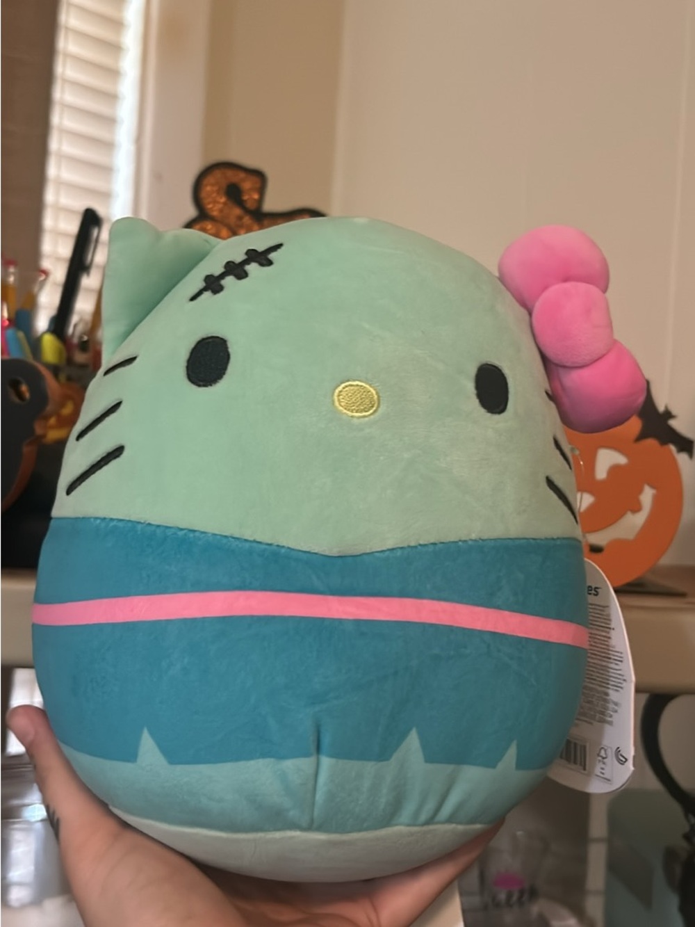 Squishmallows Mint Green Kitty Plush with Pink Bow